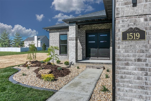 1519 Oglesby Dr, Edwardsville, IL 62025 - doorway to property featuring brick siding and a shingled roof