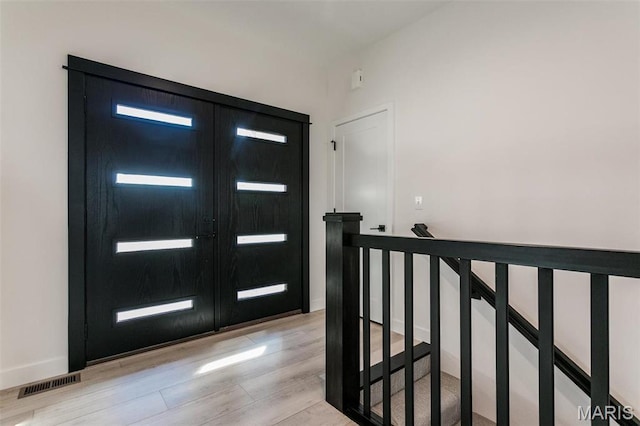 1519 Oglesby Dr, Edwardsville, IL 62025 - foyer entrance featuring light wood finished floors and baseboards