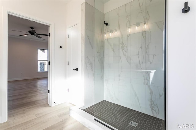 1519 Oglesby Dr, Edwardsville, IL 62025 - bathroom featuring a marble finish shower, wood finished floors, and ceiling fan
