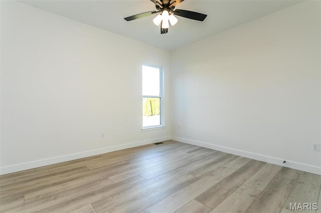 1519 Oglesby Dr, Edwardsville, IL 62025 - empty room with a ceiling fan and light wood-style floors