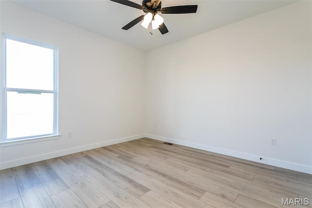 1519 Oglesby Dr, Edwardsville, IL 62025 - unfurnished room featuring light wood-style floors and a ceiling fan