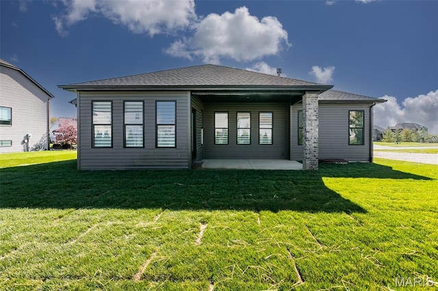 1519 Oglesby Dr, Edwardsville, IL 62025 - rear view of property featuring a patio area and a yard