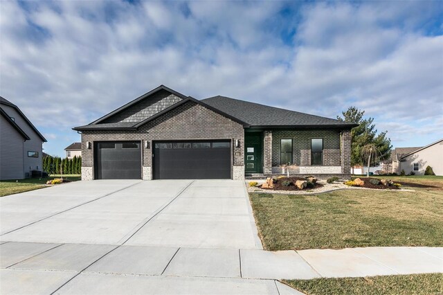 1511 Oglesby Dr, Edwardsville, IL 62025 - view of front of property with brick siding, a garage, a front lawn, and concrete driveway