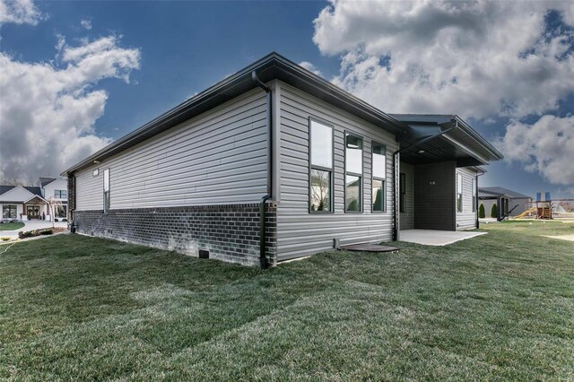 1511 Oglesby Dr, Edwardsville, IL 62025 - view of property exterior featuring a yard and a playground