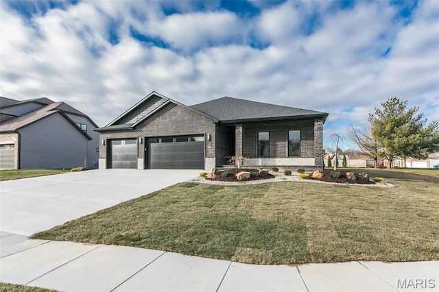 1511 Oglesby Dr, Edwardsville, IL 62025 - view of front of property featuring brick siding, an attached garage, driveway, and a front yard