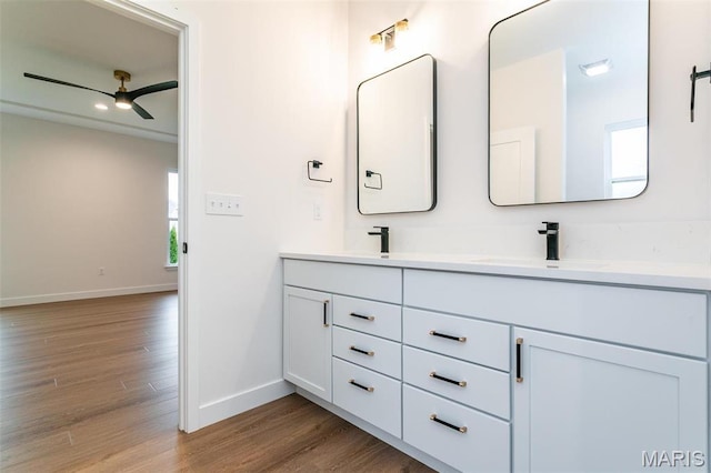 1511 Oglesby Dr, Edwardsville, IL 62025 - bathroom with a ceiling fan, double vanity, and wood finished floors