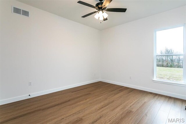 1511 Oglesby Dr, Edwardsville, IL 62025 - unfurnished room featuring dark wood finished floors and a ceiling fan