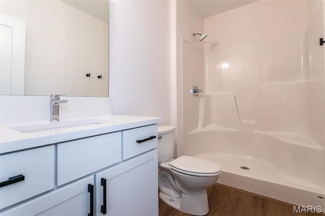 1511 Oglesby Dr, Edwardsville, IL 62025 - full bath featuring vanity, wood finished floors, and a shower