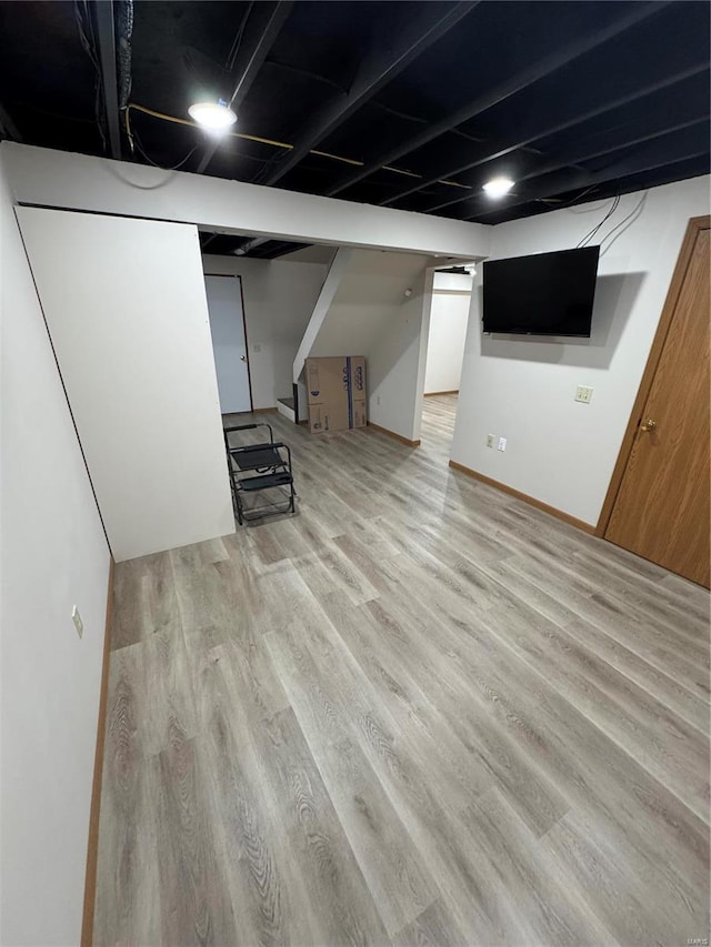 9 Summit Ln, Hermann, MO 65041 - finished below grade area featuring wood finished floors and stairs