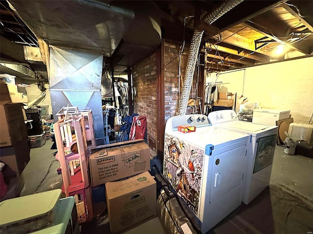 washroom featuring washing machine and dryer