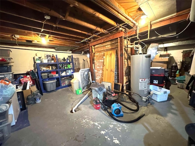 unfinished basement featuring water heater