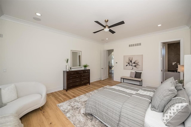 bedroom featuring crown molding, light wood-type flooring, baseboards, recessed lighting, and a ceiling fan