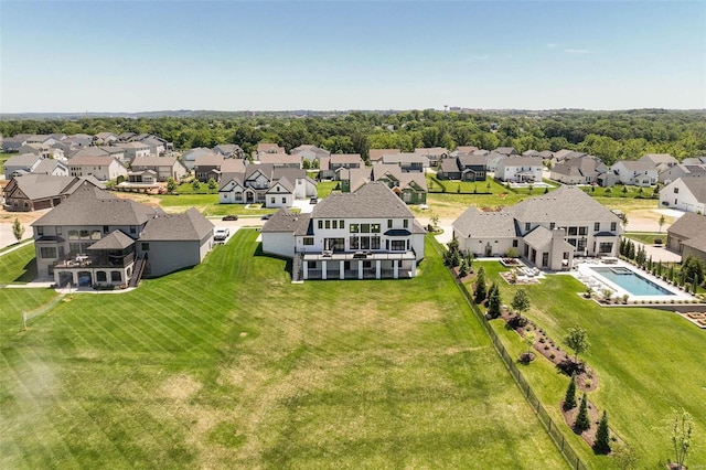 aerial perspective of suburban area with a pool