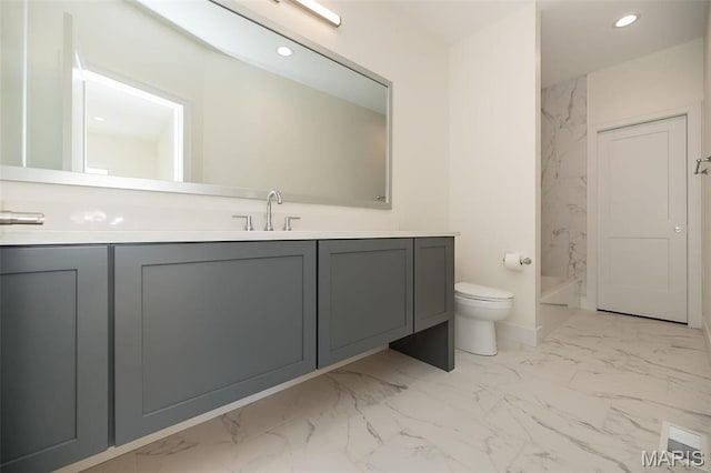 1205 Patchwork Flds, Chesterfield, MO 63005 - bathroom featuring marble look tiles, vanity, toilet, and recessed lighting