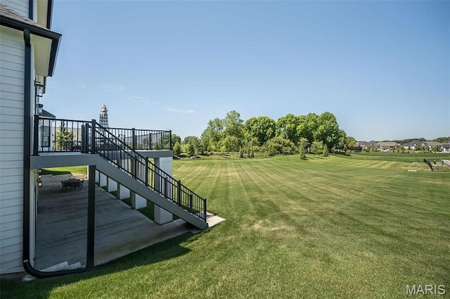 1205 Patchwork Flds, Chesterfield, MO 63005 - view of grassy yard featuring stairs and a wooden deck