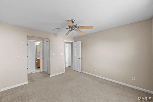 638 Homerun Dr Unit 36N, Ofallon, MO 63366 - unfurnished bedroom with light carpet, baseboards, a ceiling fan, ensuite bathroom, and a closet