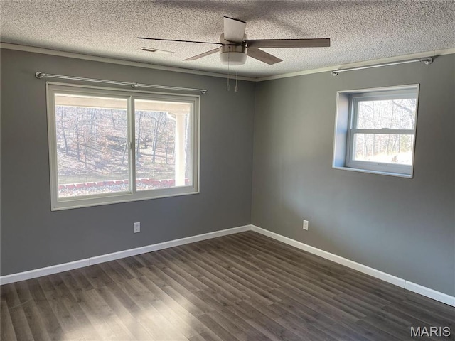 1770 Pigg Hollow Rd, Owensville, MO 65066 - unfurnished room with a textured ceiling, a ceiling fan, dark wood-style flooring, and baseboards