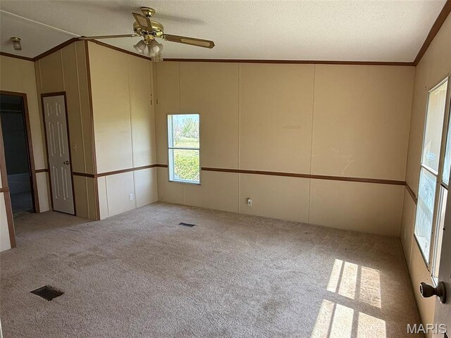 434 Whispering Wind Ln, Cape Girardeau, MO 63701 - unfurnished room featuring a decorative wall, crown molding, carpet floors, and ceiling fan