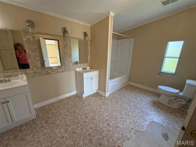 434 Whispering Wind Ln, Cape Girardeau, MO 63701 - bathroom featuring crown molding, tile patterned floors, two vanities, toilet, and baseboards
