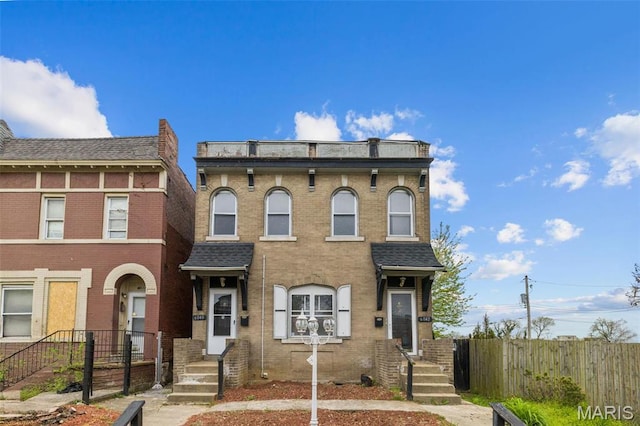 6040 Maple Ave, Saint Louis, MO 63112 - multi unit property with fence and brick siding