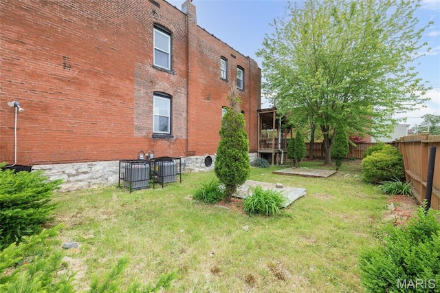 6040 Maple Ave, Saint Louis, MO 63112 - back of property featuring brick siding and a chimney