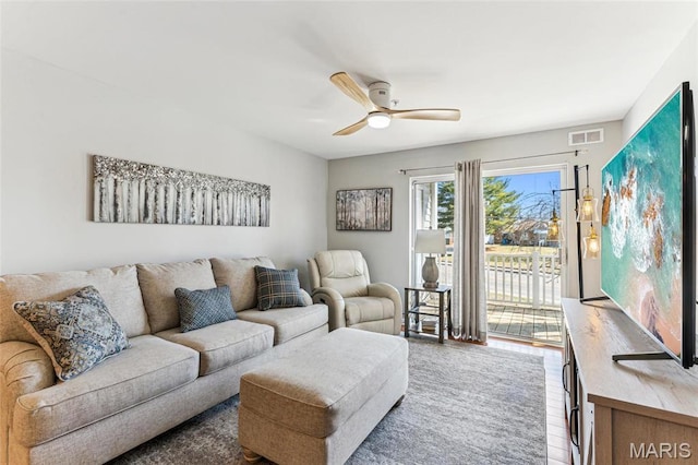 3605 Tracey Rich Unit 2B, Lemay Township, MO 63125 - living area with a ceiling fan
