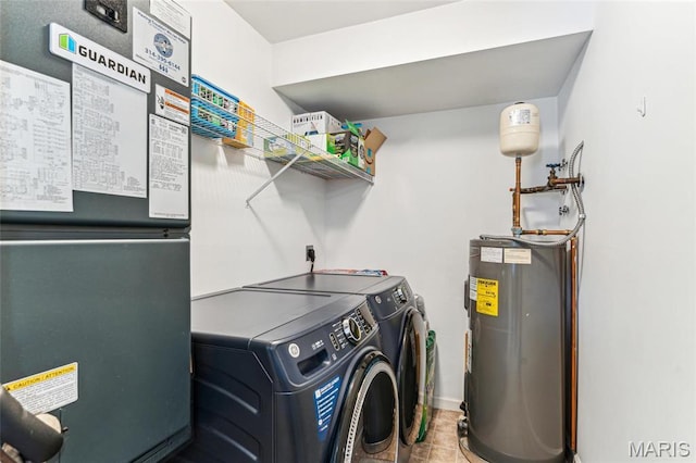 3605 Tracey Rich Unit 2B, Lemay Township, MO 63125 - laundry room featuring washing machine and dryer, electric water heater, and tile patterned floors