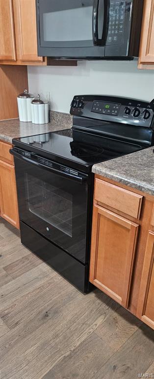 3605 Tracey Rich Unit 2B, Lemay Township, MO 63125 - kitchen featuring black appliances