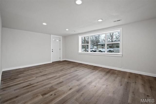 700 W Main St, Union, MO 63084 - spare room featuring wood finished floors, baseboards, and recessed lighting