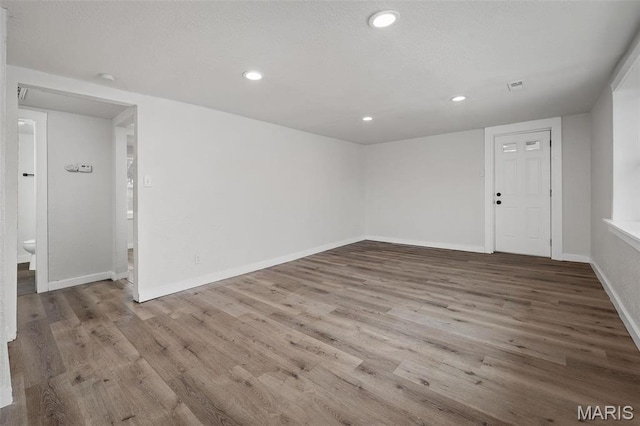 700 W Main St, Union, MO 63084 - spare room with wood finished floors, baseboards, and recessed lighting
