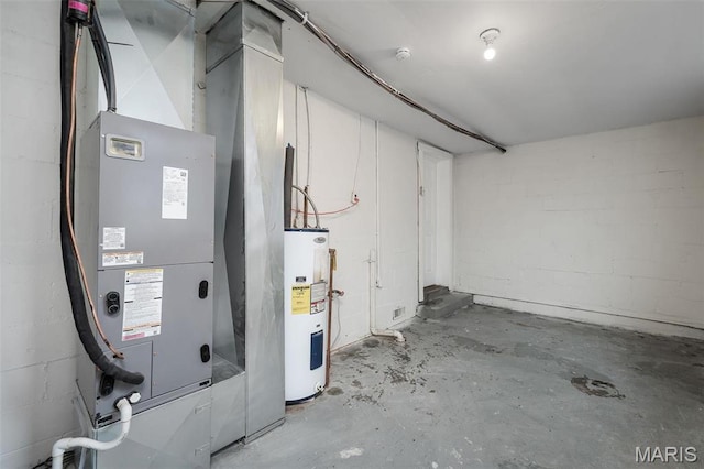 700 W Main St, Union, MO 63084 - utility room featuring electric water heater and heating unit