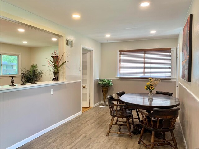 2903 Lesmer Ct, Overland, MO 63114 - dining area with wood finished floors, recessed lighting, and baseboards