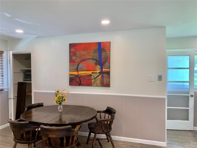 2903 Lesmer Ct, Overland, MO 63114 - dining area featuring wood finished floors, recessed lighting, and a wainscoted wall