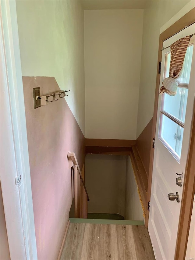 2903 Lesmer Ct, Overland, MO 63114 - stairs with wood finished floors