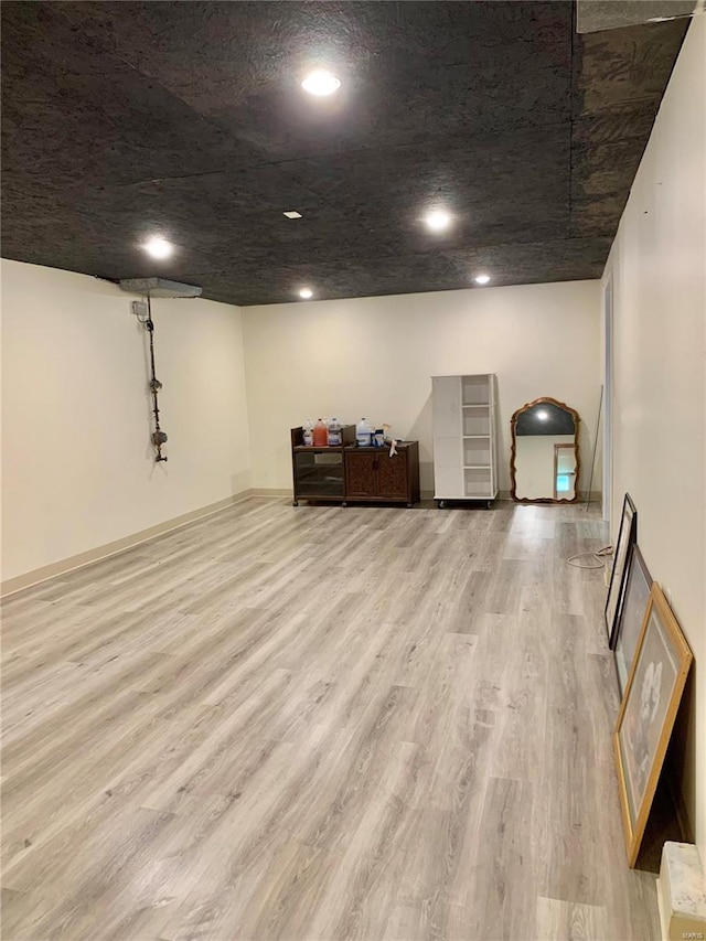 2903 Lesmer Ct, Overland, MO 63114 - finished basement featuring wood finished floors and recessed lighting