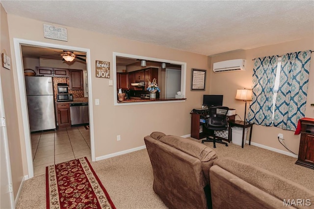 12561 Carroll Dr, Rolla, MO 65401 - office space with a wall mounted AC, light colored carpet, ceiling fan, a textured ceiling, and baseboards