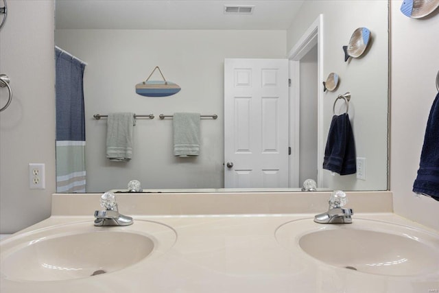 bathroom with double vanity
