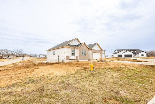 212 Ashurst Ln, Ofallon, IL 62269 - property in mid-construction featuring an attached garage