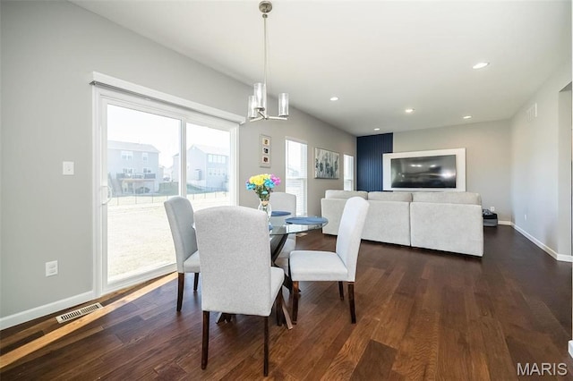 408 Sawgrass Ct, Saint Charles, MO 63301 - dining room with dark wood-type flooring, baseboards, recessed lighting, and a chandelier