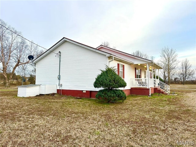 6474 State Highway H, Benton, MO 63736 - view of side of home with covered porch, crawl space, and a yard