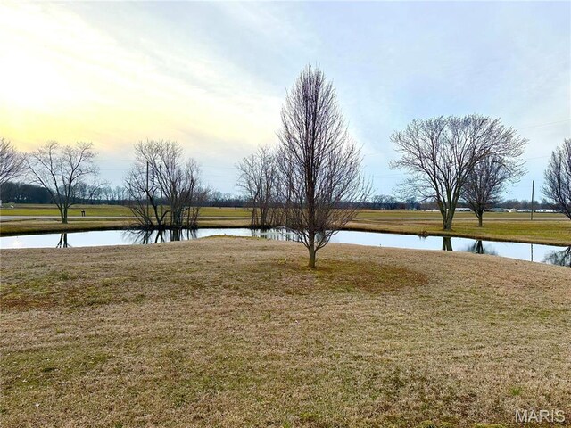 6474 State Highway H, Benton, MO 63736 - yard at dusk featuring a water view and a yard