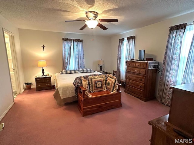 6474 State Highway H, Benton, MO 63736 - carpeted bedroom featuring multiple windows, a ceiling fan, and a textured ceiling