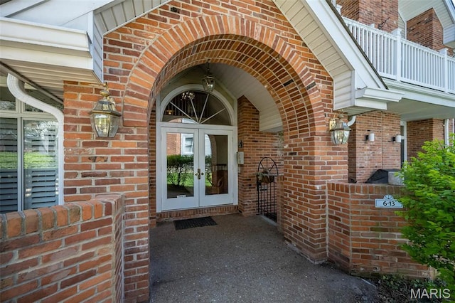 12 Country Club Ter, Glendale, MO 63122 - doorway to property featuring french doors and brick siding