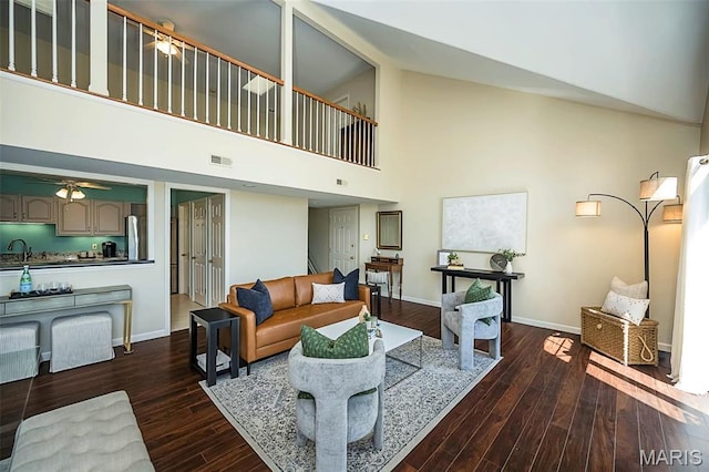 12 Country Club Ter, Glendale, MO 63122 - living room with a towering ceiling, dark wood finished floors, baseboards, and a ceiling fan