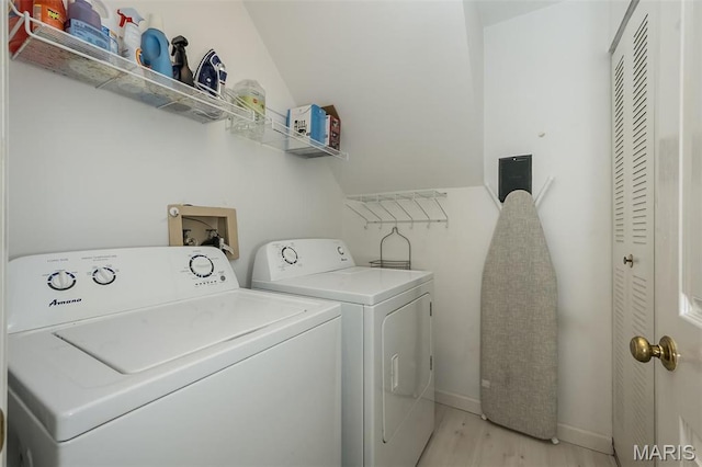 12 Country Club Ter, Glendale, MO 63122 - laundry area featuring separate washer and dryer, light wood finished floors, and baseboards