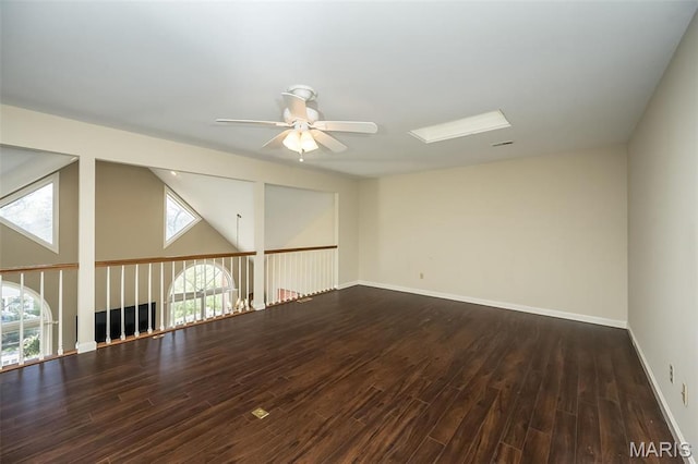 12 Country Club Ter, Glendale, MO 63122 - empty room with ceiling fan, plenty of natural light, wood finished floors, and baseboards