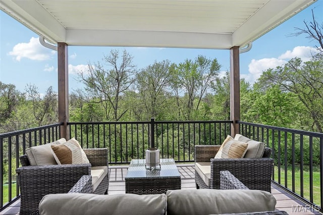 5019 Pacific Crest Trl, Cottleville, MO 63304 - wooden terrace featuring an outdoor living space and a forest view