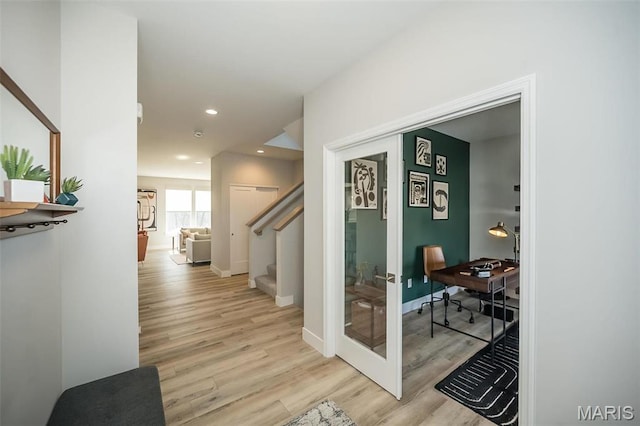 5019 Pacific Crest Trl, Cottleville, MO 63304 - corridor with light wood-style flooring, stairway, baseboards, recessed lighting, and a desk