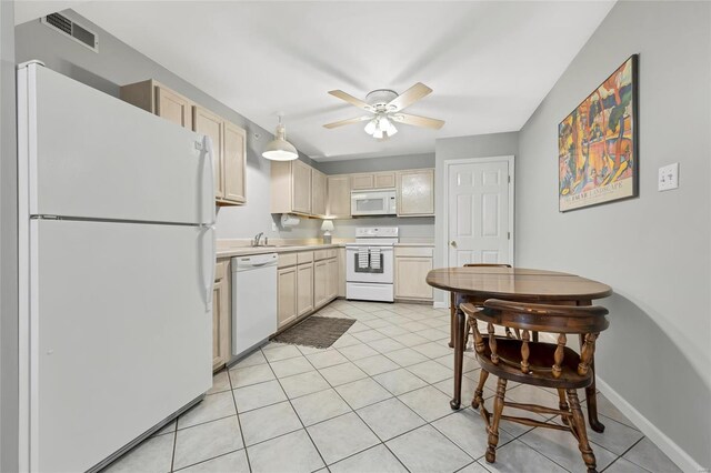 14 Eagle Rock Cv Unit 307, Valley Park, MO 63088 - kitchen featuring white appliances, ceiling fan, light countertops, light tile patterned floors, and light brown cabinetry