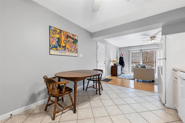 14 Eagle Rock Cv Unit 307, Valley Park, MO 63088 - dining area featuring a ceiling fan, baseboards, and light tile patterned floors